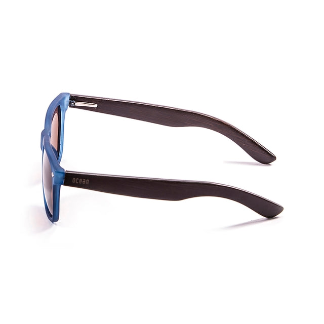 OCEAN GLASSES BEACH WOOD 50010.5 sunglasses featuring a full-rimmed brown plastic frame in a stylish rectangle shape.