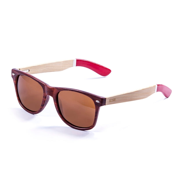 OCEAN GLASSES BEACH WOOD 50300.3 in vibrant red color with a full-rimmed rectangular frame, perfect for beach outings.