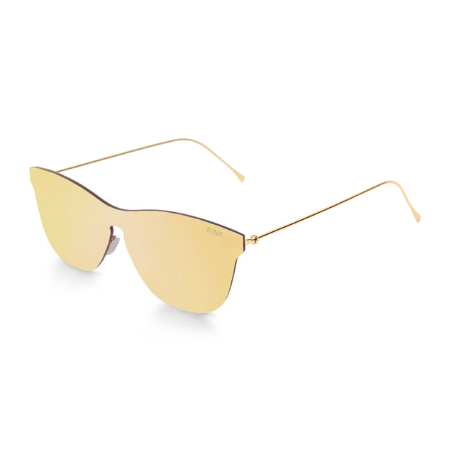 OCEAN GLASSES GENOVA 23.5 featuring a full-rimmed round frame in gold color, made from durable nylon material.