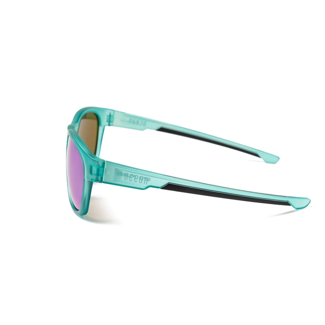 OCEAN GLASSES GOLDCOAST 73.4 featuring a transparent full-rimmed warp frame, ideal for unisex wear.