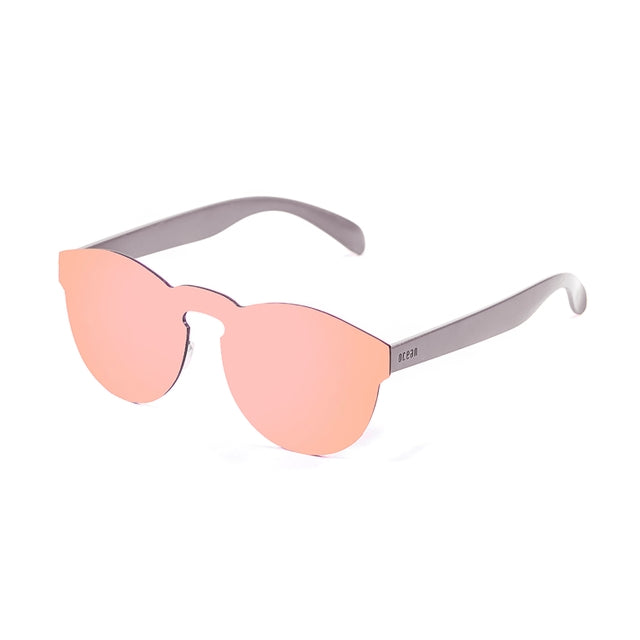 OCEAN GLASSES IBIZA 21.7 in vibrant pink color with a round full-rimmed design, suitable for unisex wear.