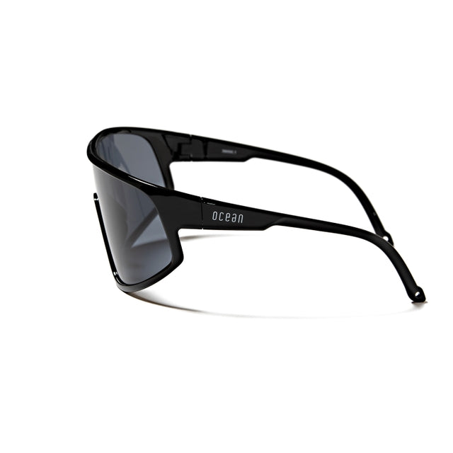 OCEAN GLASSES KILLY 39000.1 full-rimmed black eyewear with a modern warp shape, suitable for unisex wear.