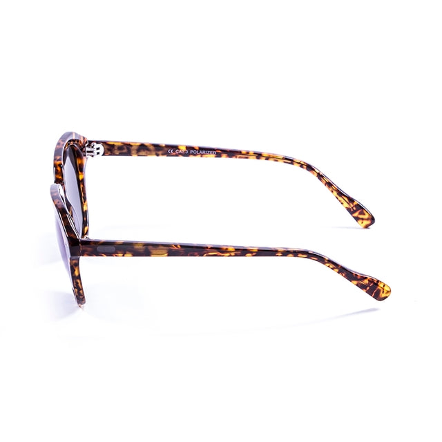 OCEAN GLASSES MAVERICKS 10000.1 featuring a round full-rimmed brown acetate frame, suitable for unisex wear.