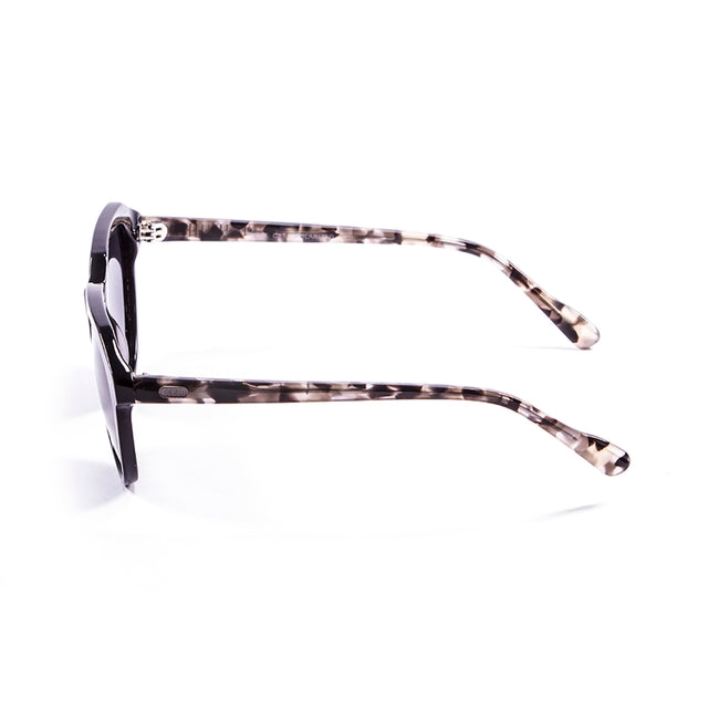 OCEAN GLASSES MAVERICKS 10000.4 featuring a full-rimmed round brown acetate frame, designed for unisex wear.