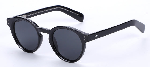 OCEAN GLASSES MONTREAL 10800.1 featuring a full-rimmed round black acetate frame, suitable for unisex wear.