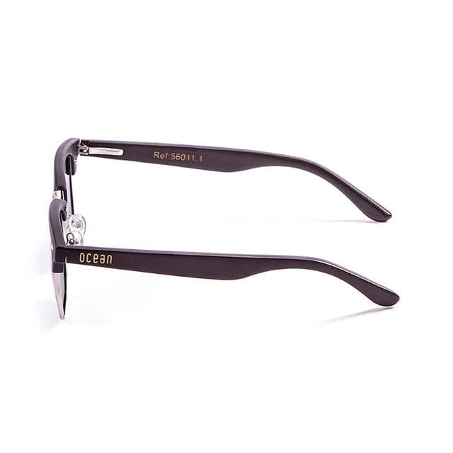 OCEAN GLASSES REMEMBER 56011.1 featuring a round full-rimmed black plastic frame, suitable for unisex wear.