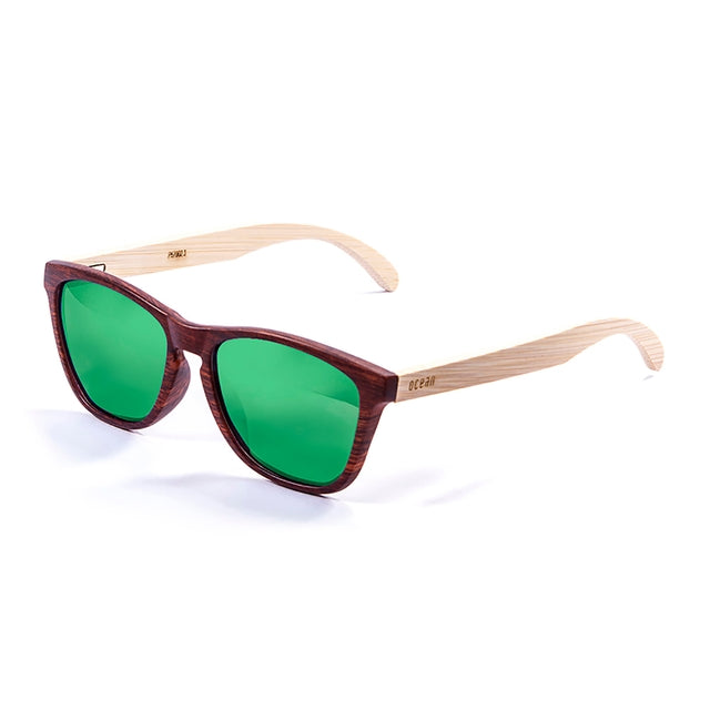 OCEAN GLASSES SEA WOOD 57002.3 featuring a round full-rimmed brown frame, designed for unisex wear, showcasing its stylish and durable plastic material.