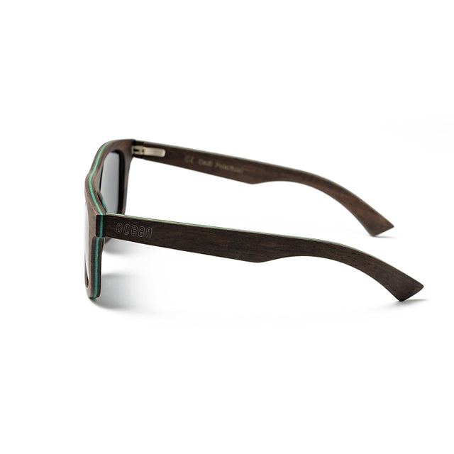 OCEAN GLASSES VENICE BEACH 54001.7 featuring a stylish wooden frame in brown color, designed for unisex wear.