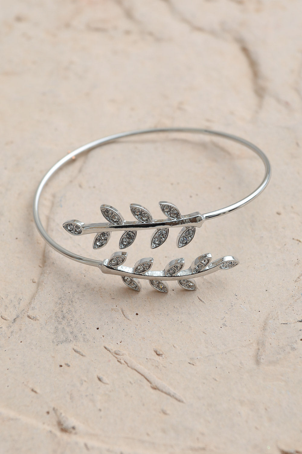 Olive Branch Minimal Bracelet featuring copper leaf embellishments, showcasing a stylish and elegant design.