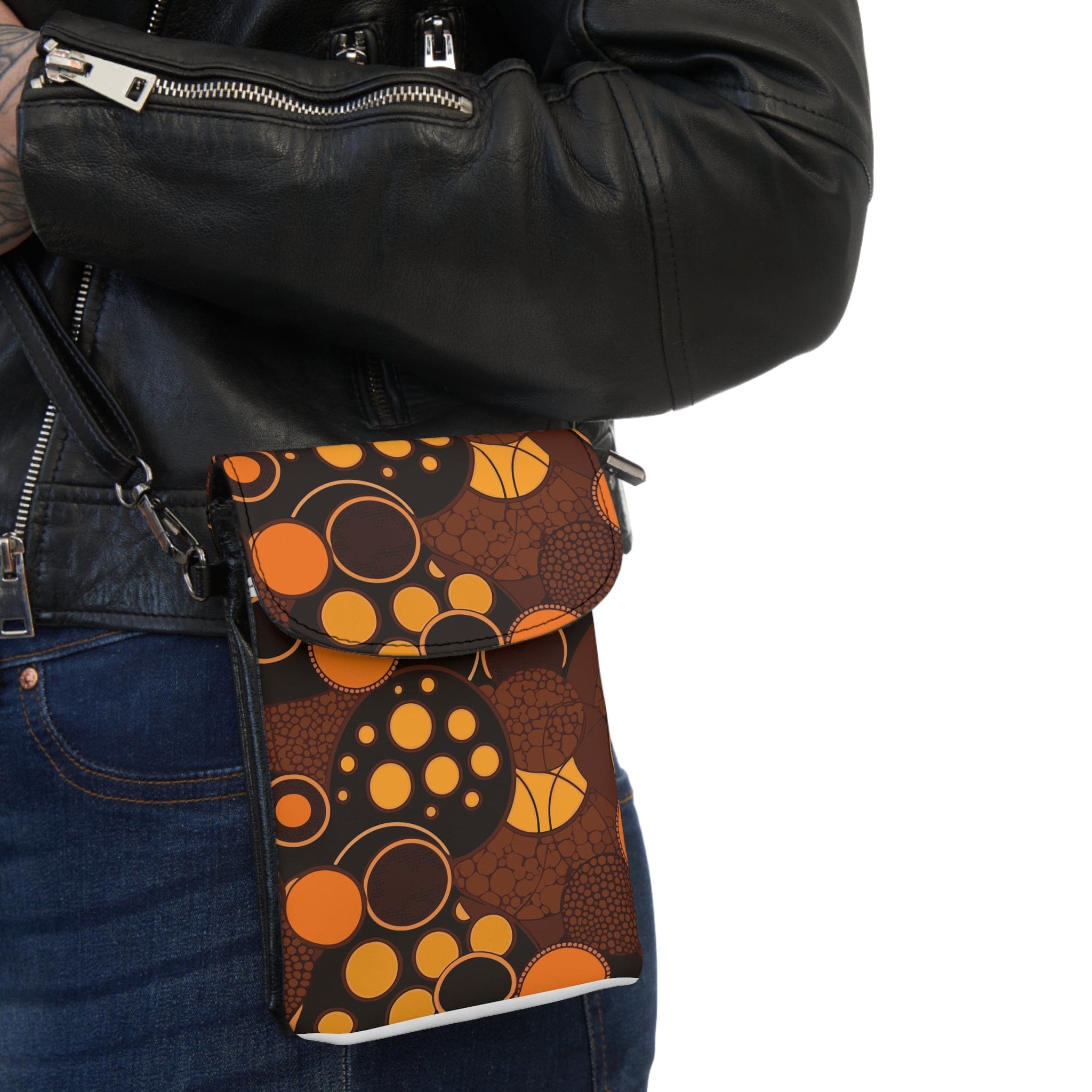 Orange and brown spotted crossbody cell phone wallet with adjustable strap and card slots.