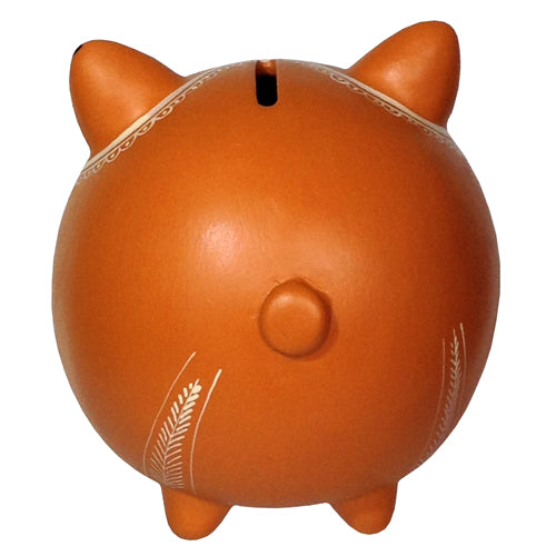 Handmade orange ceramic pig bank crafted by Peruvian artisans, featuring a removable rubber stopper and vibrant color.