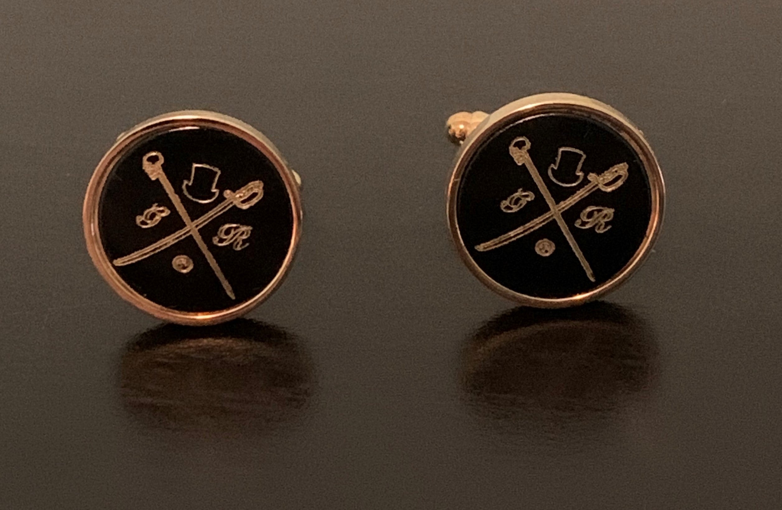 Original GR Black on Gold Cufflinks showcasing elegant design and luxurious colors.