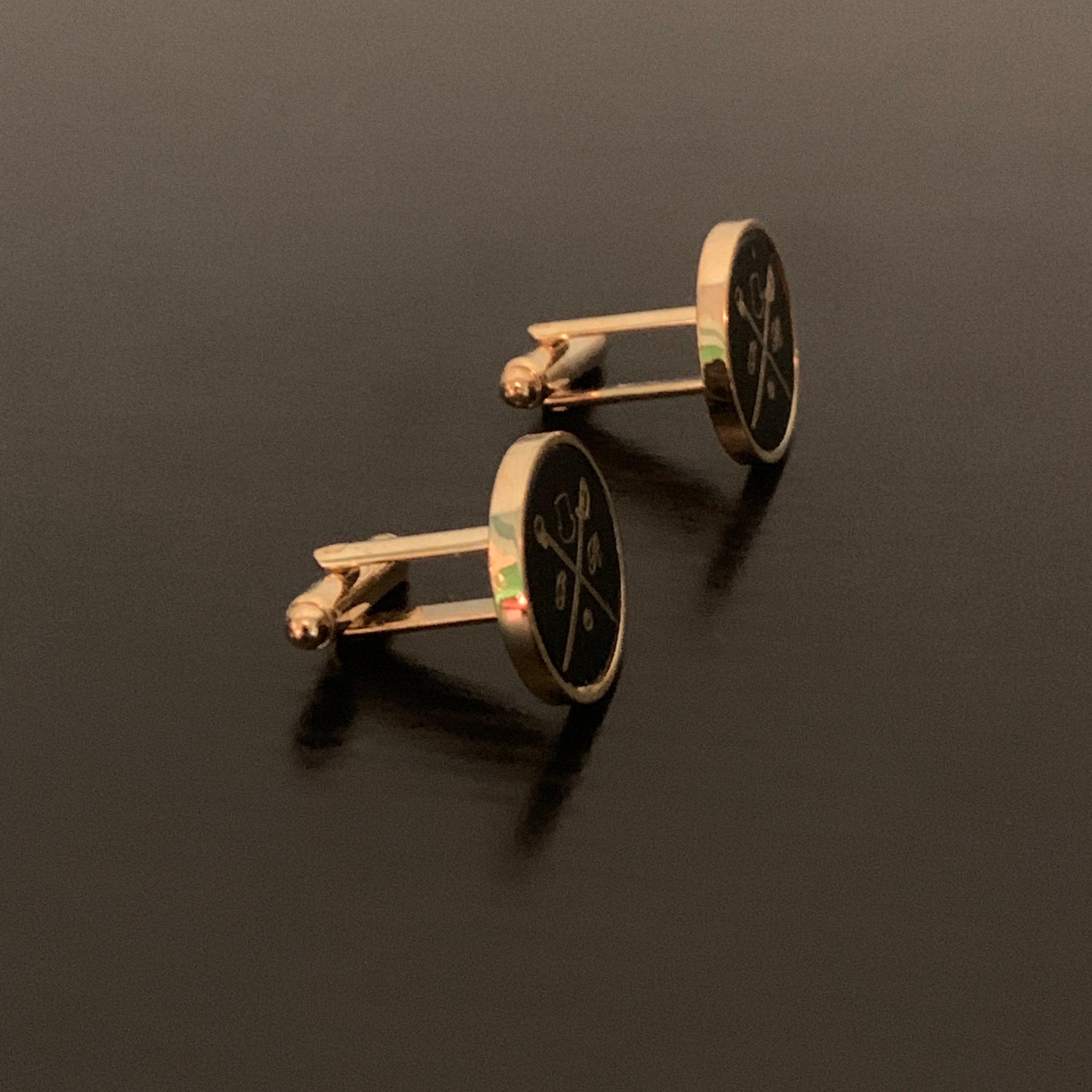 Original GR Black on Gold Cufflinks showcasing elegant design and luxurious colors.