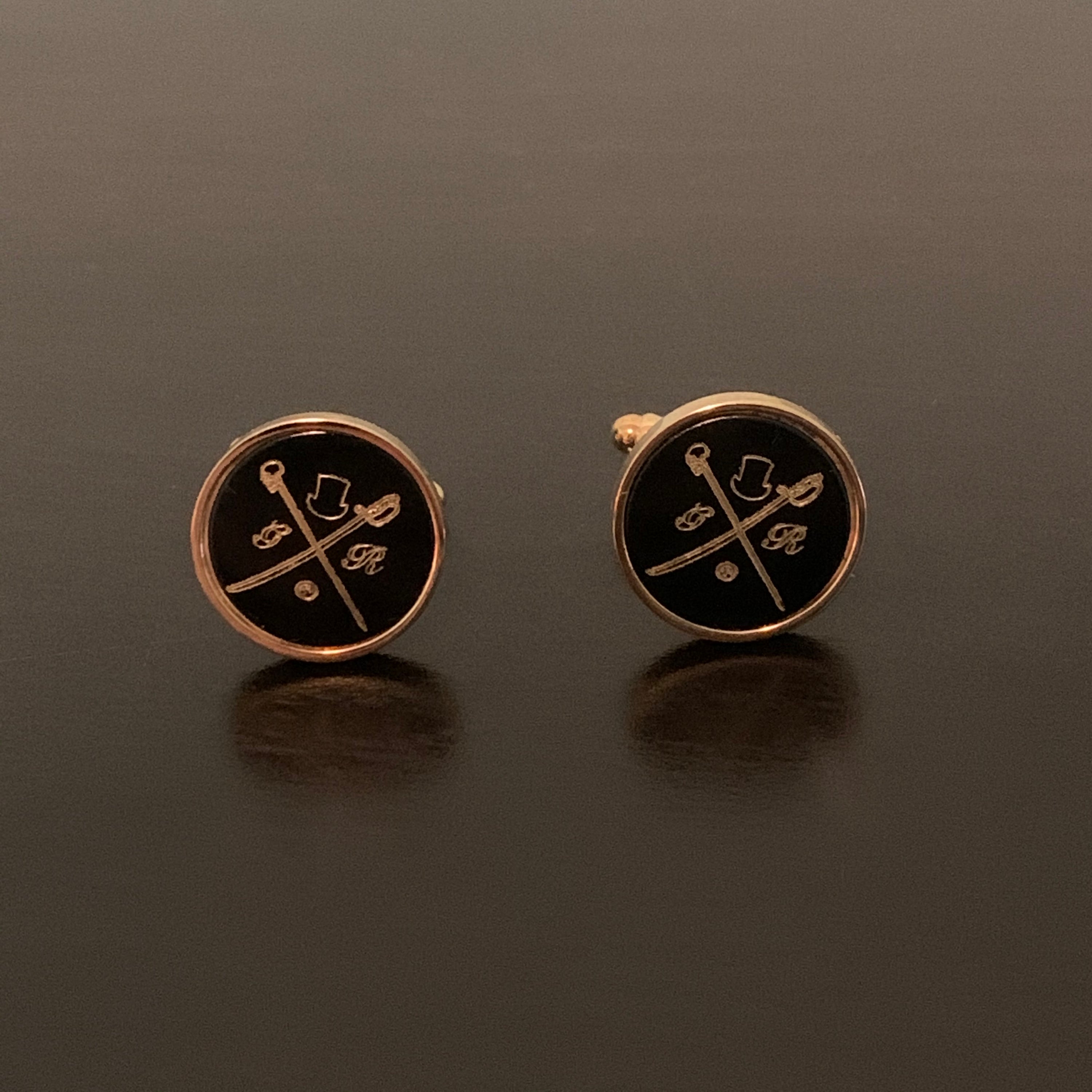 Original GR Black on Gold Cufflinks showcasing elegant design and luxurious colors.