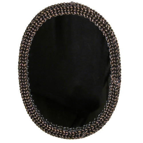 Oval mirror framed with intricately woven recycled bicycle chains, showcasing artisan craftsmanship from India.