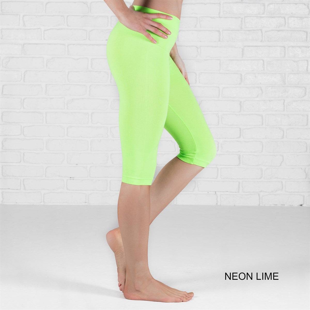 Over Knee Crop Shorts Leggings in various colors, showcasing their stretchy fabric and over-the-knee design.