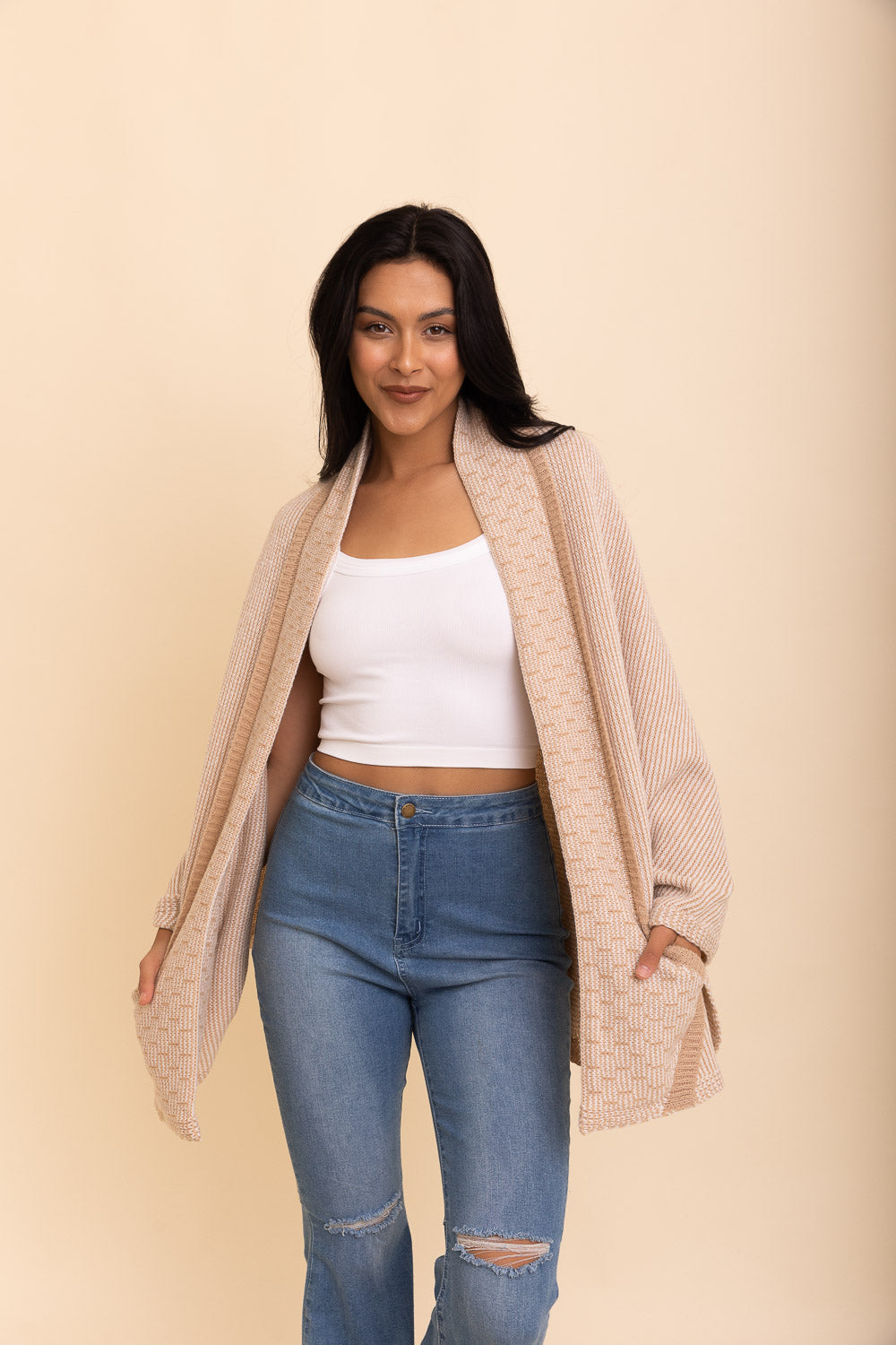 Cozy Over The Shoulder Knitted Shawl in various colors, featuring an oversized fit and pockets, perfect for stylish layering.