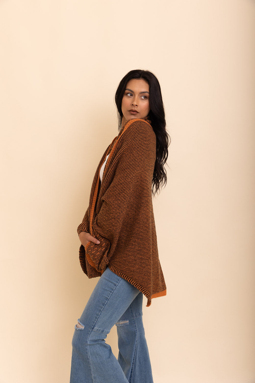 Cozy Over The Shoulder Knitted Shawl in various colors, featuring an oversized fit and pockets, perfect for stylish layering.