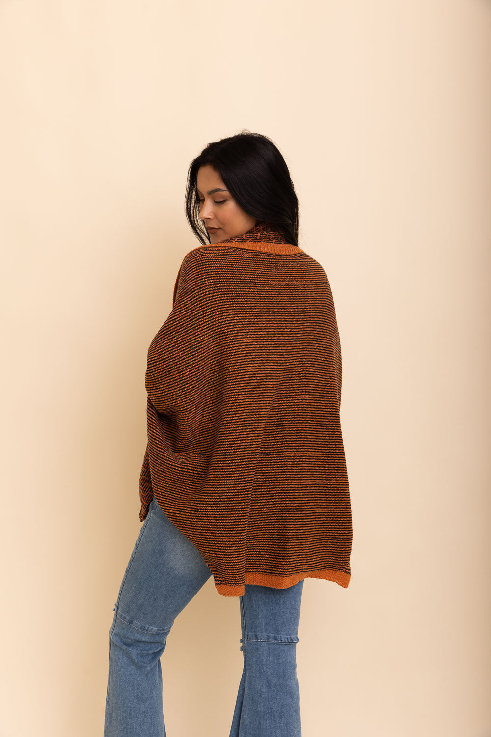 Cozy Over The Shoulder Knitted Shawl in various colors, featuring an oversized fit and pockets, perfect for stylish layering.