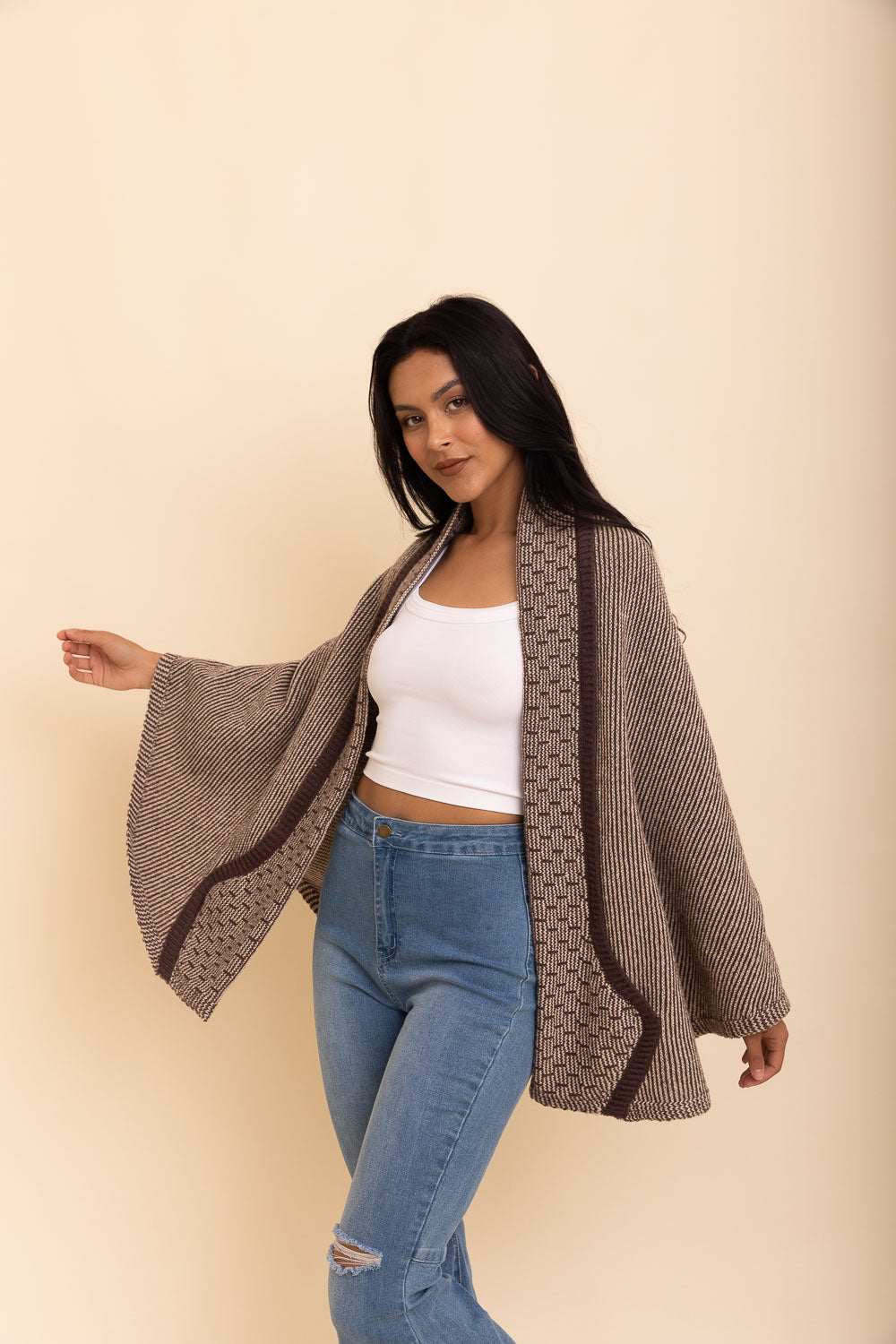 Cozy Over The Shoulder Knitted Shawl in various colors, featuring an oversized fit and pockets, perfect for stylish layering.