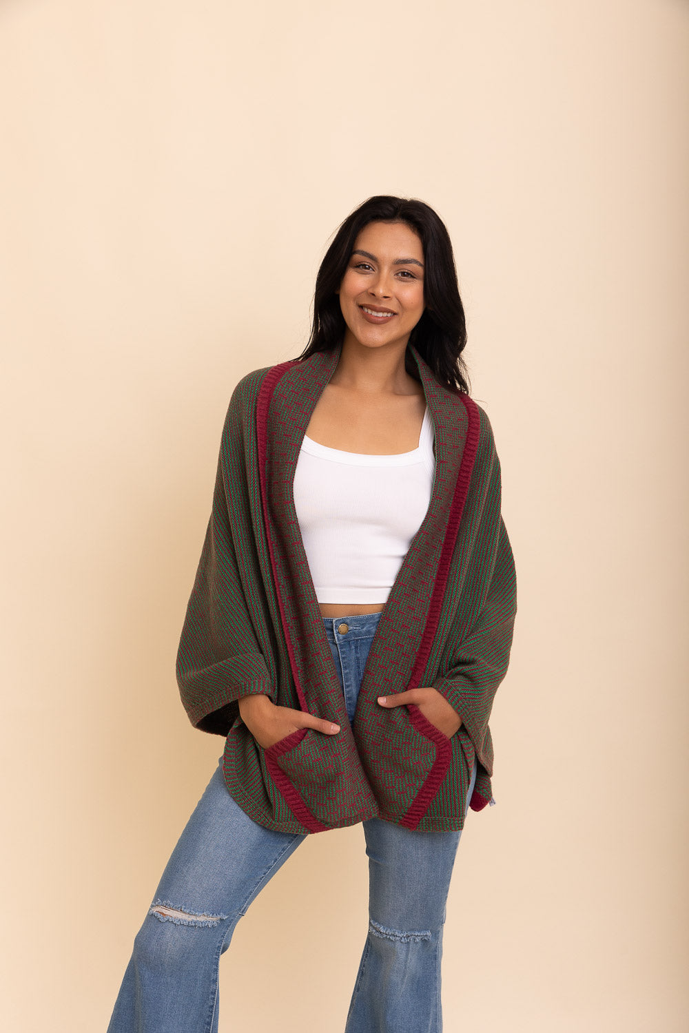 Cozy Over The Shoulder Knitted Shawl in various colors, featuring an oversized fit and pockets, perfect for stylish layering.