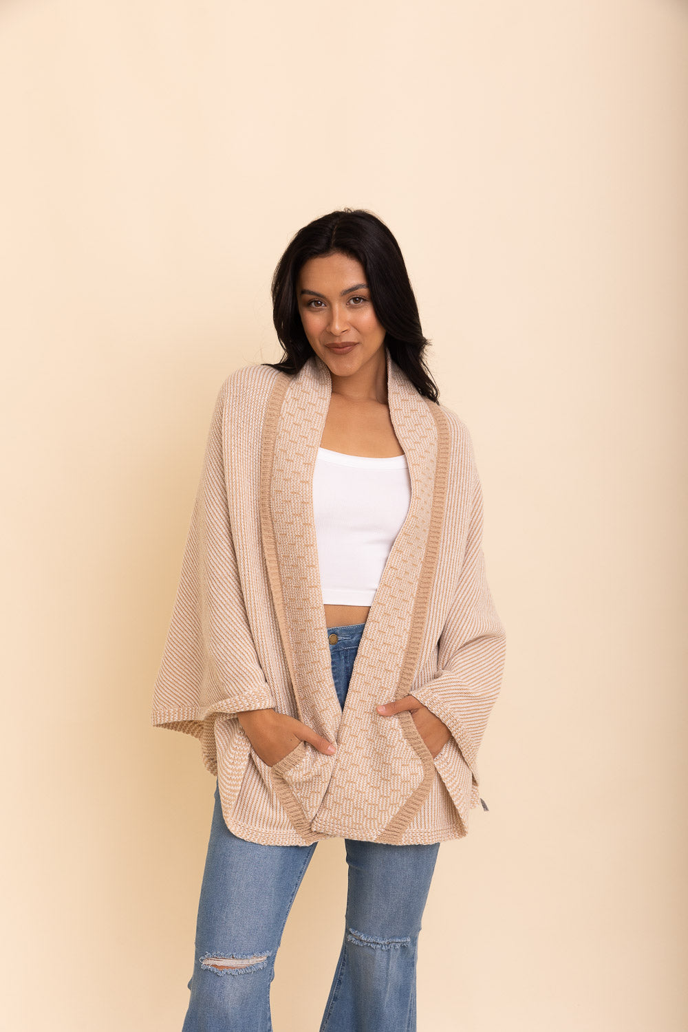 Cozy Over The Shoulder Knitted Shawl in various colors, featuring an oversized fit and pockets, perfect for stylish layering.