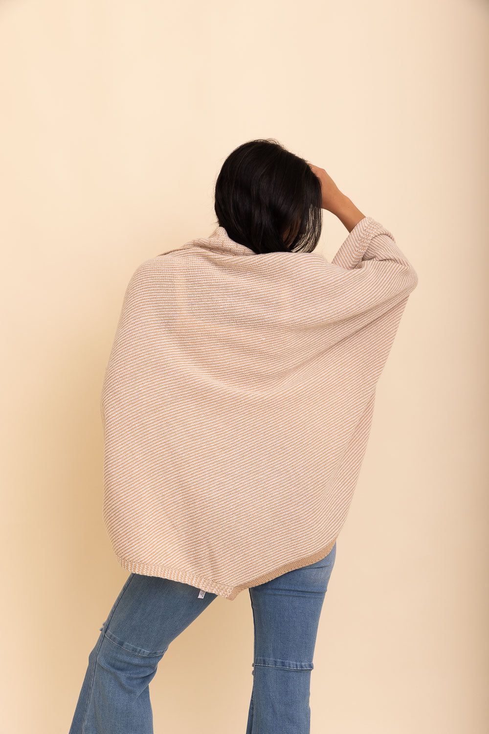 Cozy Over The Shoulder Knitted Shawl in various colors, featuring an oversized fit and pockets, perfect for stylish layering.