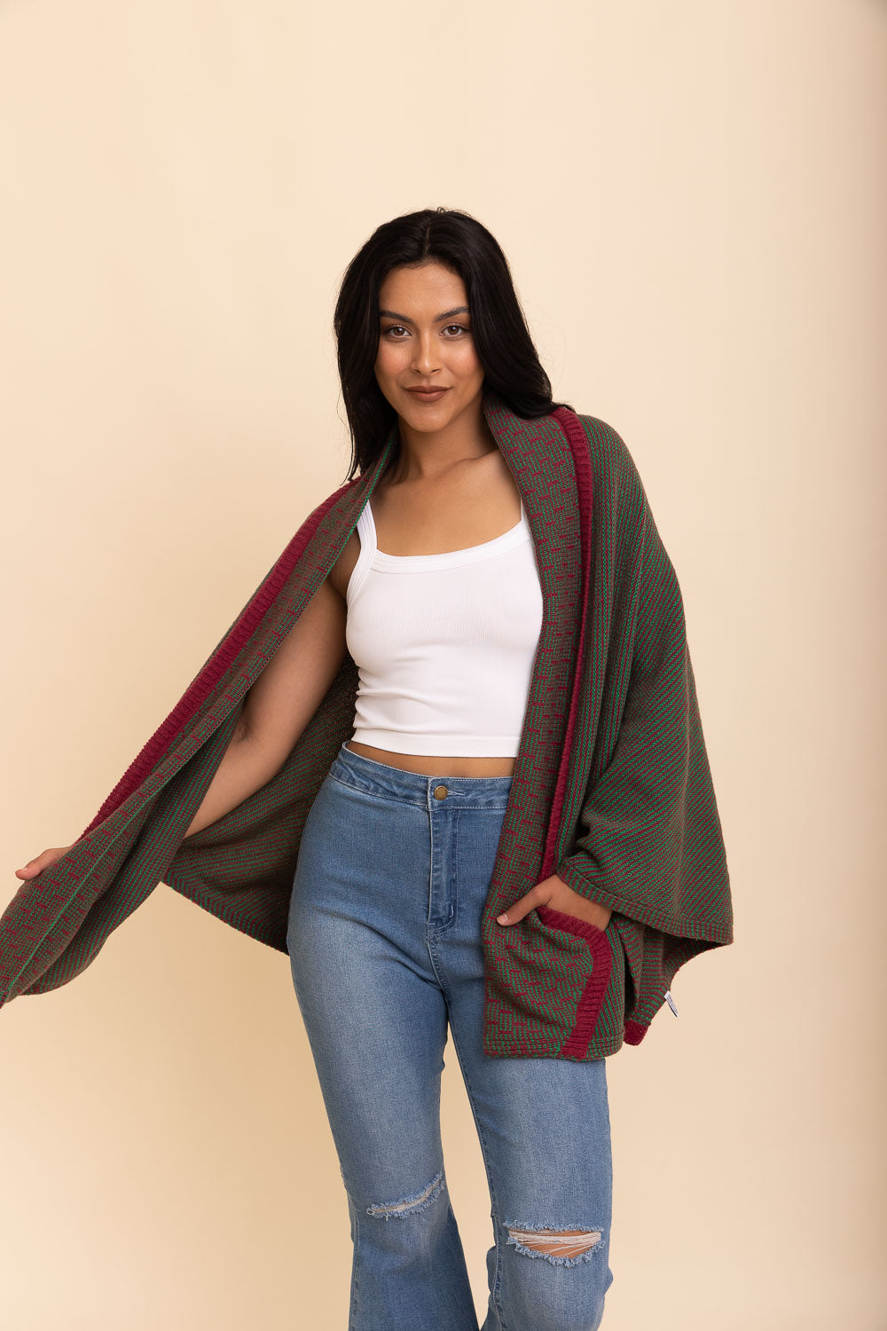 Cozy Over The Shoulder Knitted Shawl in various colors, featuring an oversized fit and pockets, perfect for stylish layering.