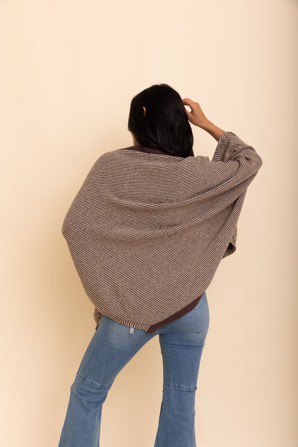 Cozy Over The Shoulder Knitted Shawl in various colors, featuring an oversized fit and pockets, perfect for stylish layering.