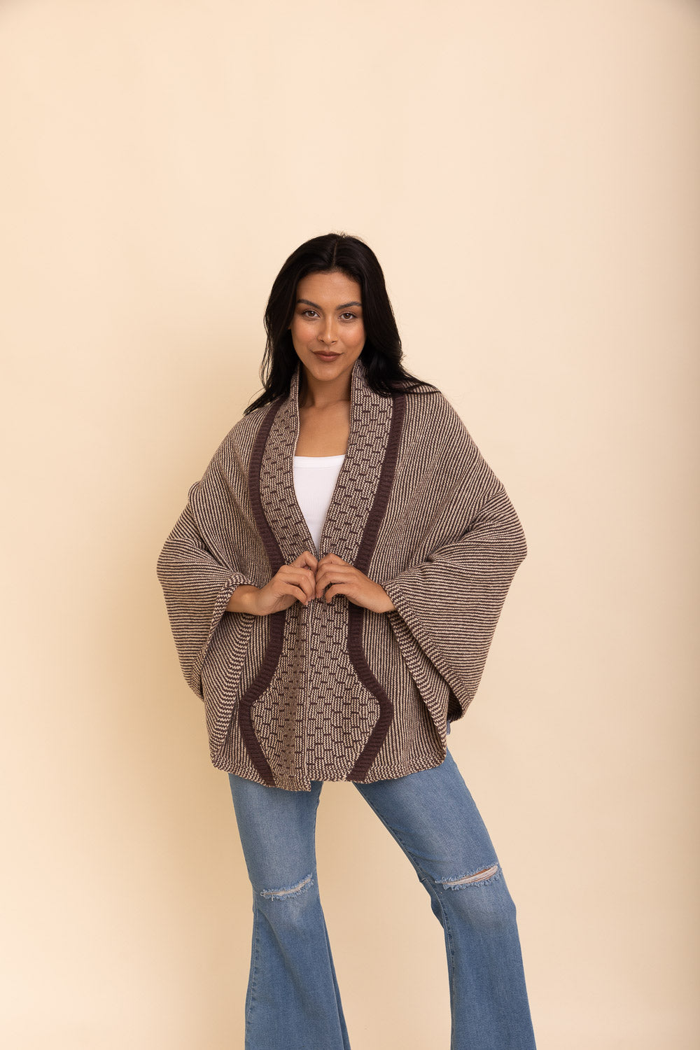 Cozy Over The Shoulder Knitted Shawl in various colors, featuring an oversized fit and pockets, perfect for stylish layering.