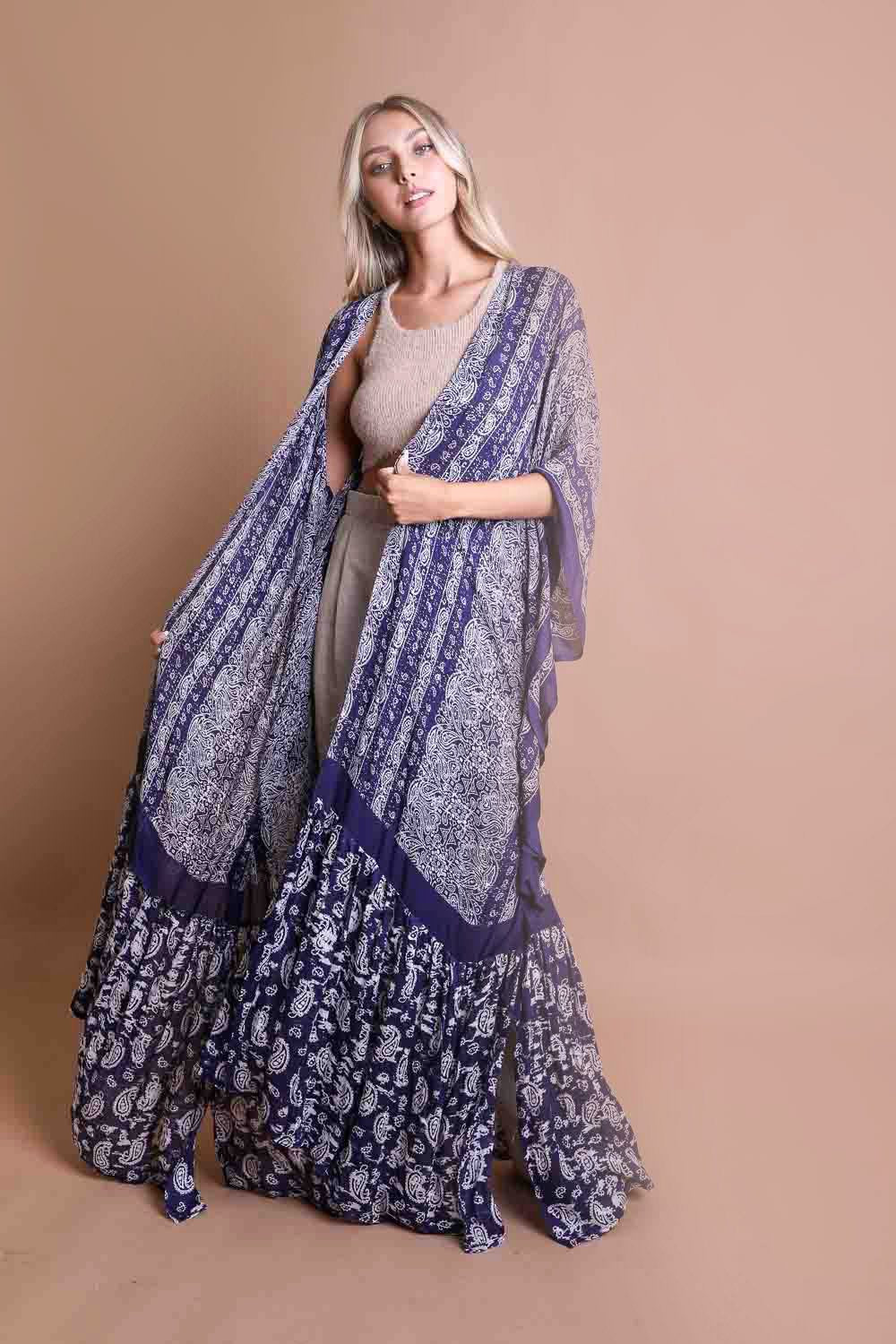 A stylish Paisley Free Flow Kimono featuring vibrant paisley patterns in flowy fabric, perfect for summer wear.