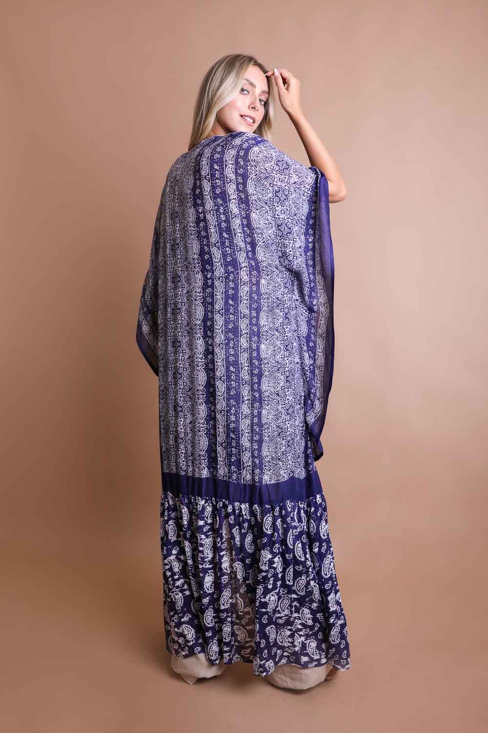 A stylish Paisley Free Flow Kimono featuring vibrant paisley patterns in flowy fabric, perfect for summer wear.