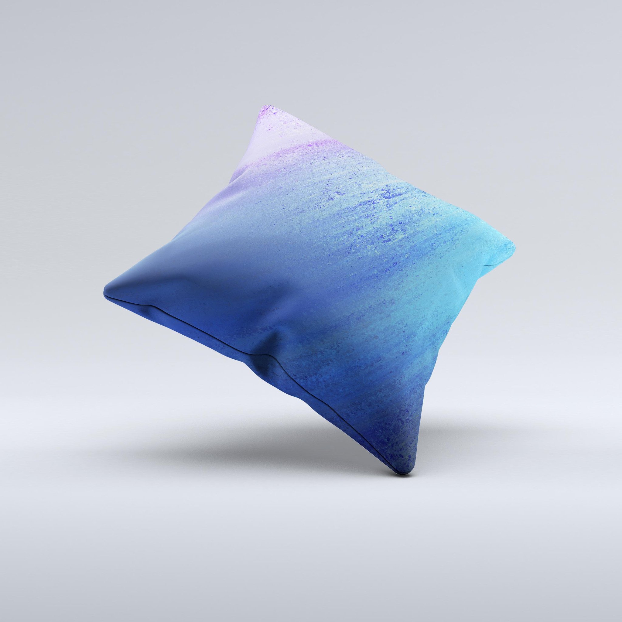 Pastel blue decorative throw pillow with unique ink-fuzed design, handcrafted in Virginia, showcasing high-quality fabric and filling.