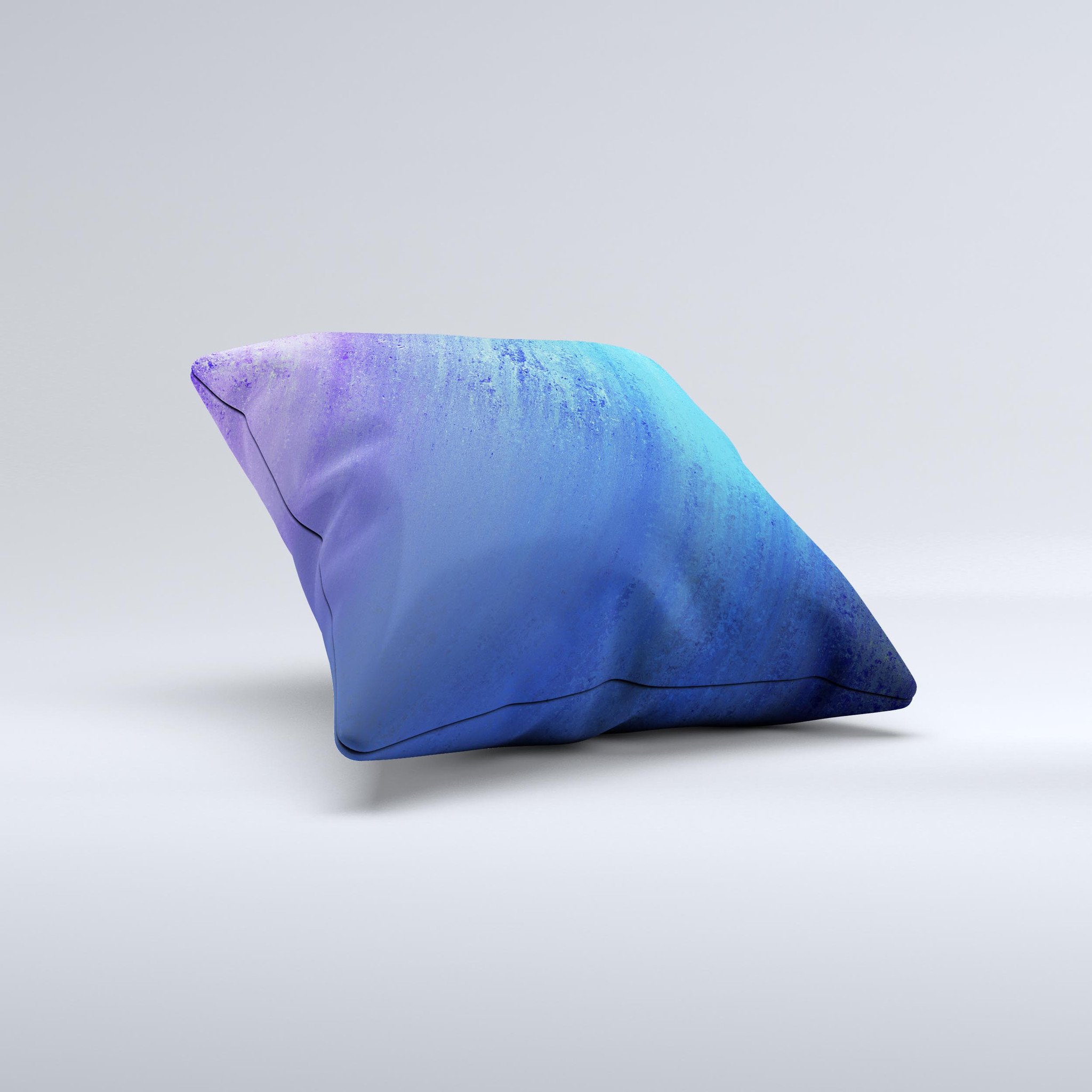 Pastel blue decorative throw pillow with unique ink-fuzed design, handcrafted in Virginia, showcasing high-quality fabric and filling.