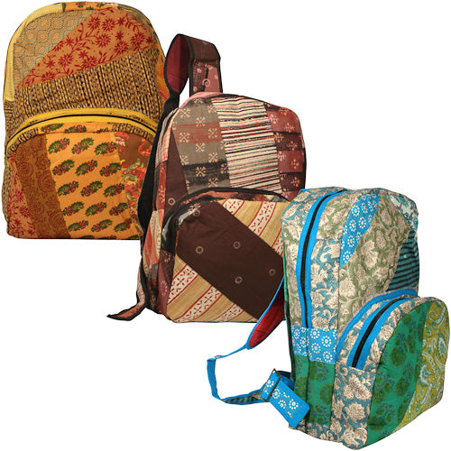 Colorful Patchwork Daypack made from recycled fabrics, featuring adjustable straps and multiple pockets, handmade by youth artisans in India.