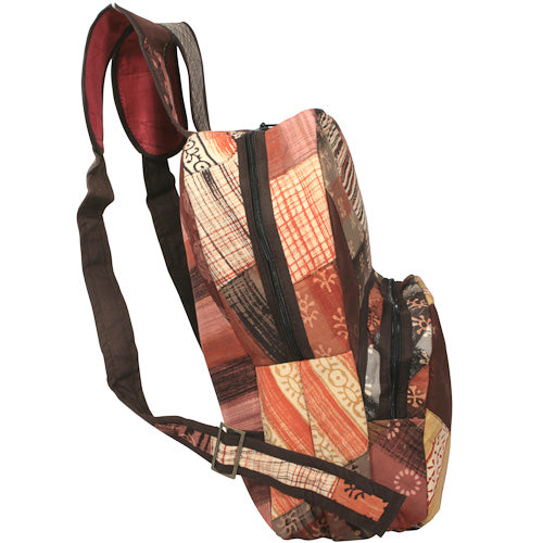 Colorful Patchwork Daypack made from recycled fabrics, featuring adjustable straps and multiple pockets, handmade by youth artisans in India.