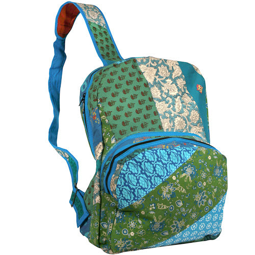 Colorful Patchwork Daypack made from recycled fabrics, featuring adjustable straps and multiple pockets, handmade by youth artisans in India.