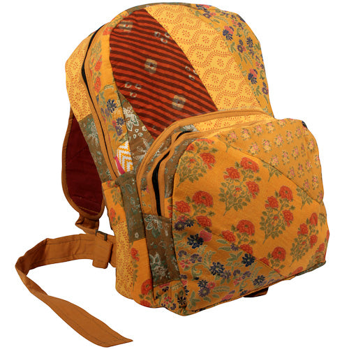 Colorful Patchwork Daypack made from recycled fabrics, featuring adjustable straps and multiple pockets, handmade by youth artisans in India.