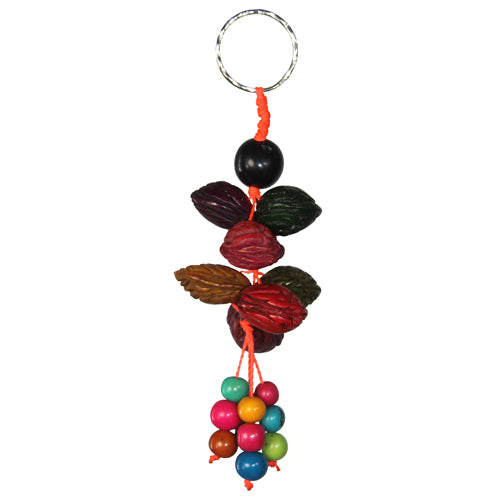 Colorful Peach Pit Key Chain made with peach pits and tagua beads, showcasing unique artisan craftsmanship.