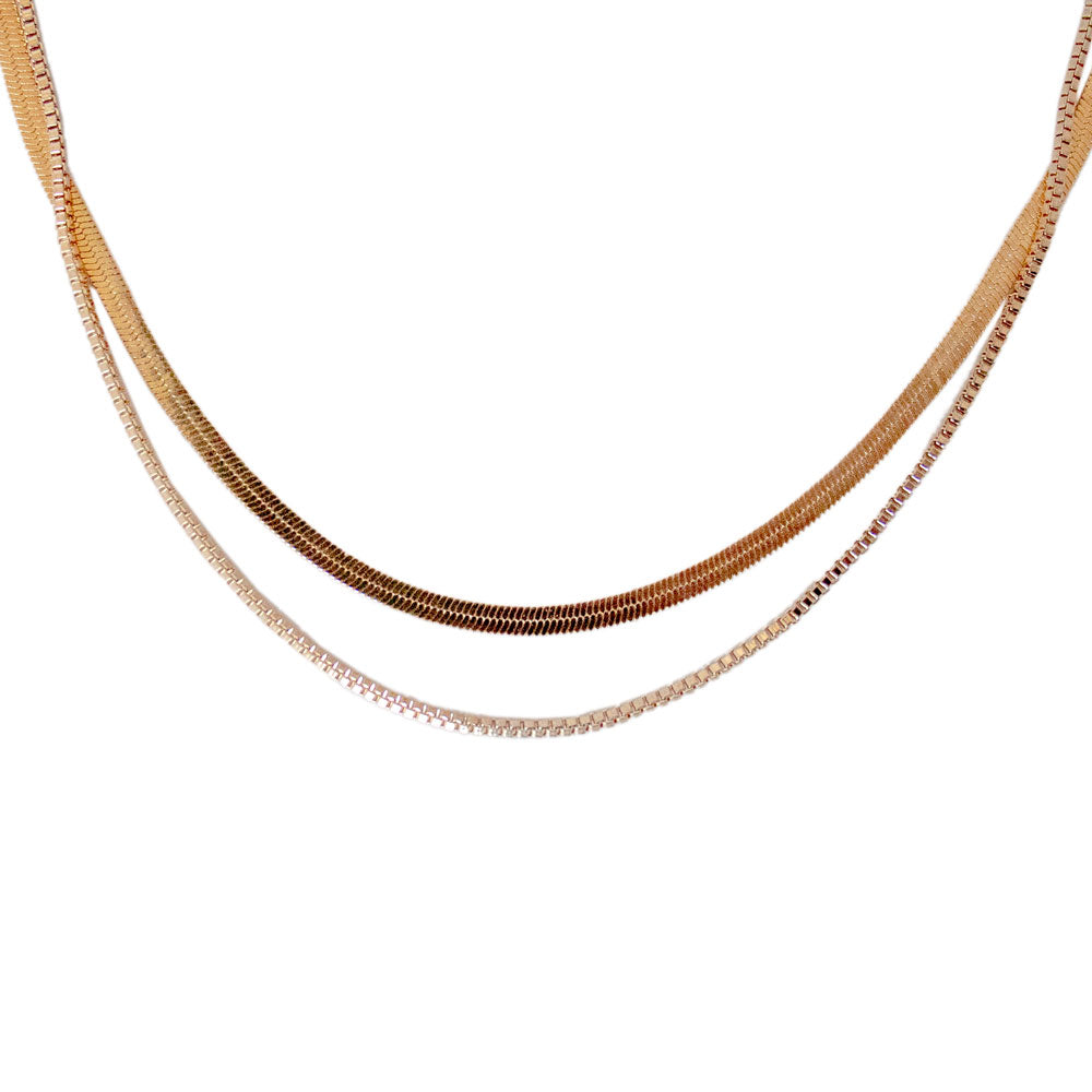 Penelope Layered Herringbone Chain Necklace featuring a double-layered design in 18K gold plated alloy.