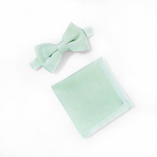 Peppermint knitted bow tie and matching pocket square set displayed elegantly, showcasing their vibrant color and knitted texture.