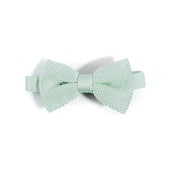 A stylish peppermint knitted bow tie displayed on a neutral background, showcasing its texture and color.