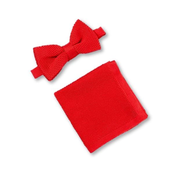 Pillar box red knitted bow tie and matching pocket square set displayed elegantly on a white background.