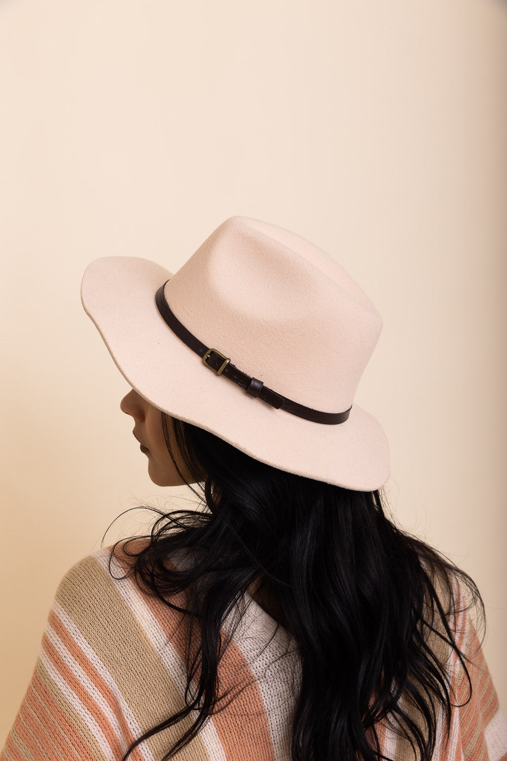 A stylish pinched front western style hat made of 100% polyester, perfect for adding flair to any outfit.