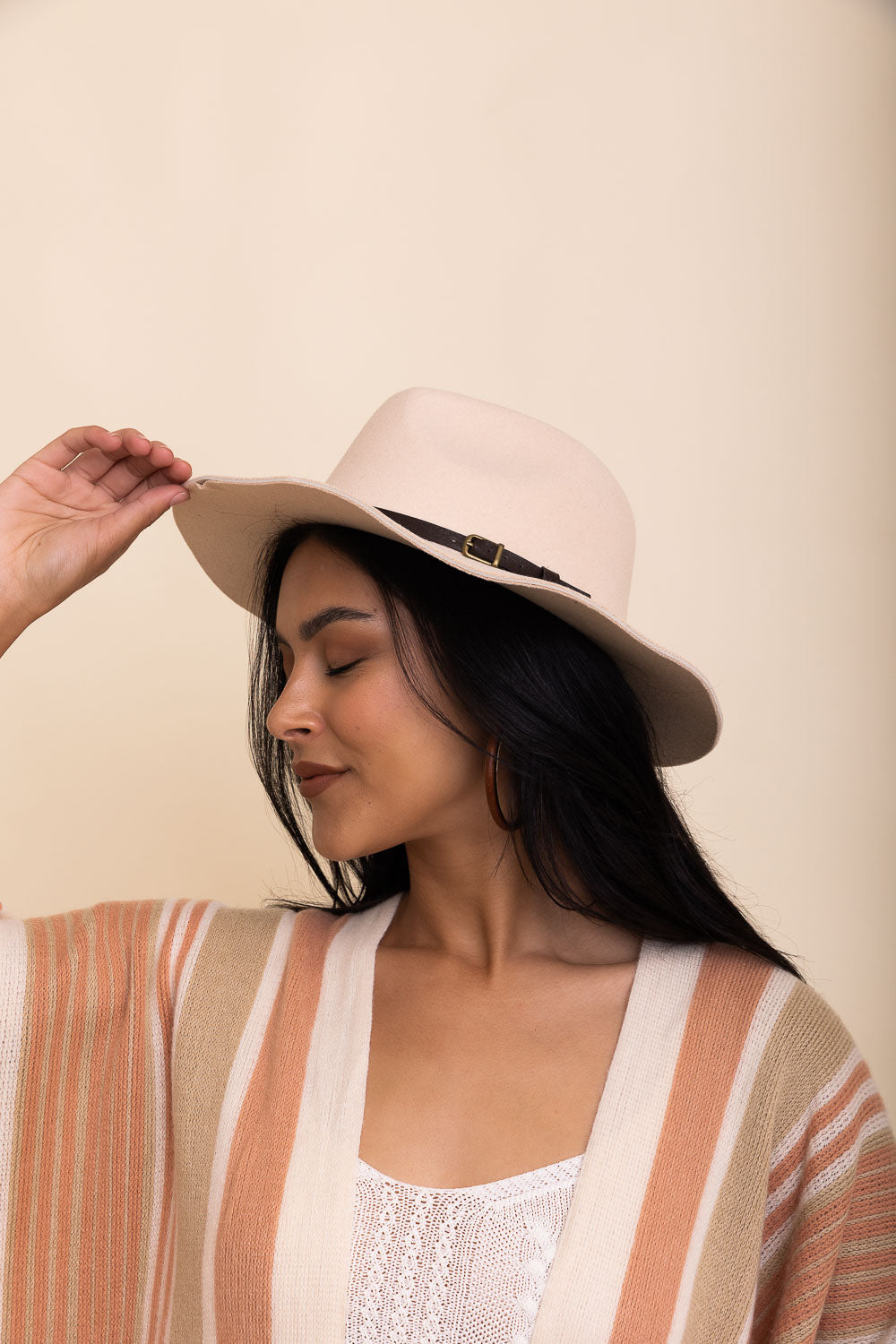 A stylish pinched front western style hat made of 100% polyester, perfect for adding flair to any outfit.