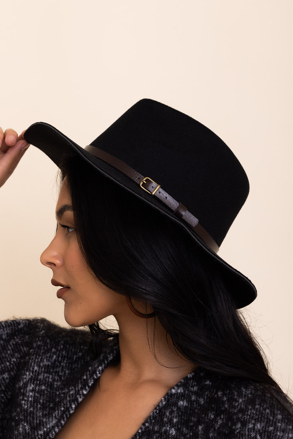 A stylish pinched front western style hat made of 100% polyester, perfect for adding flair to any outfit.