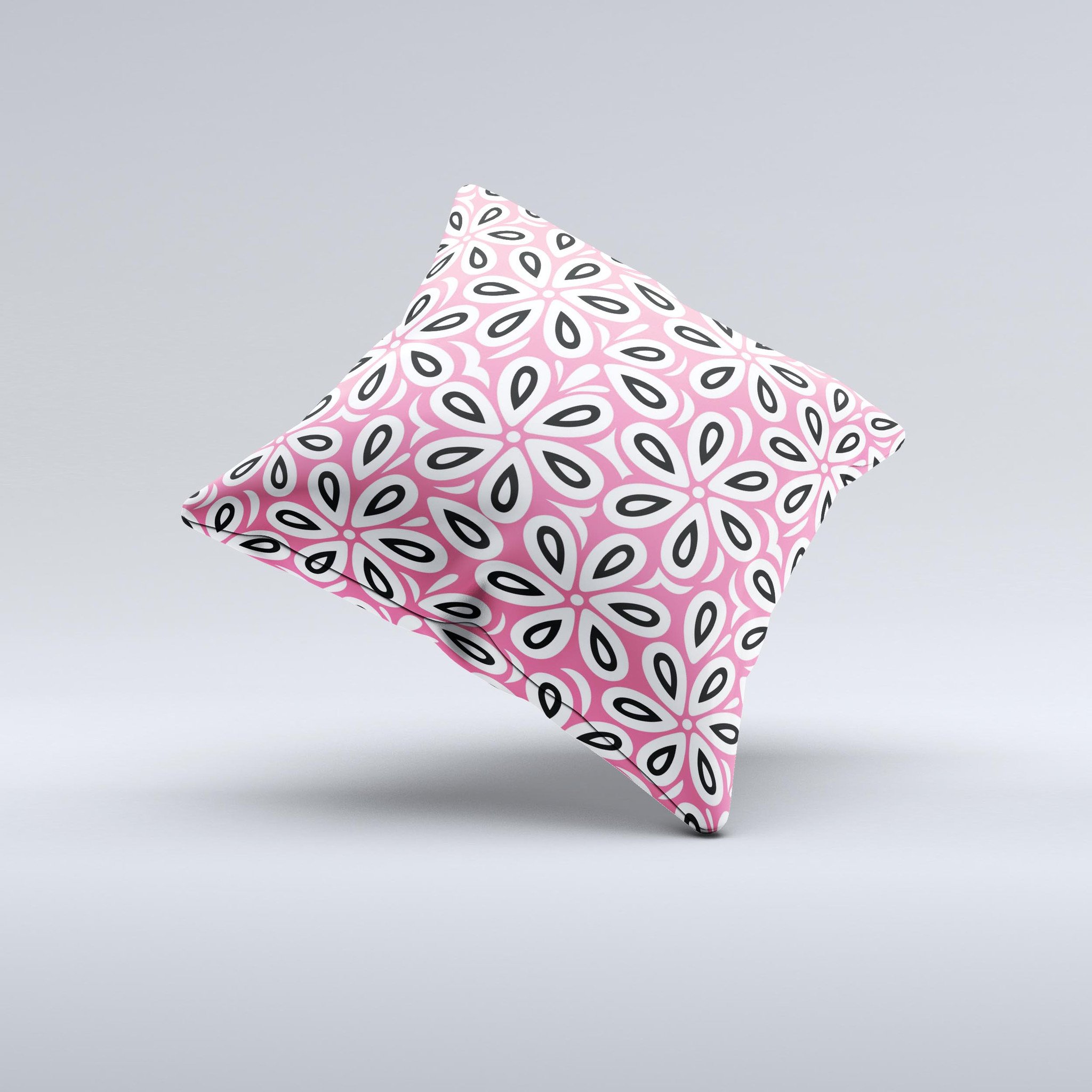 Pink and black decorative throw pillow featuring a floral vector pattern, handcrafted in Virginia with high-quality materials.