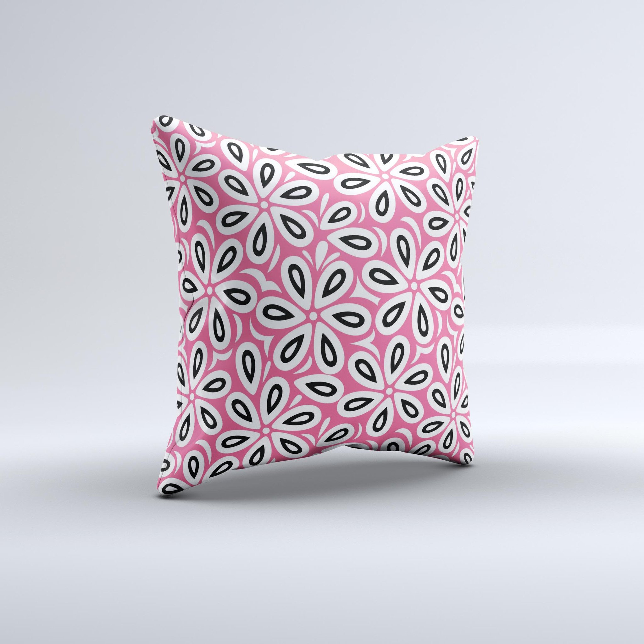 Pink and black decorative throw pillow featuring a floral vector pattern, handcrafted in Virginia with high-quality materials.