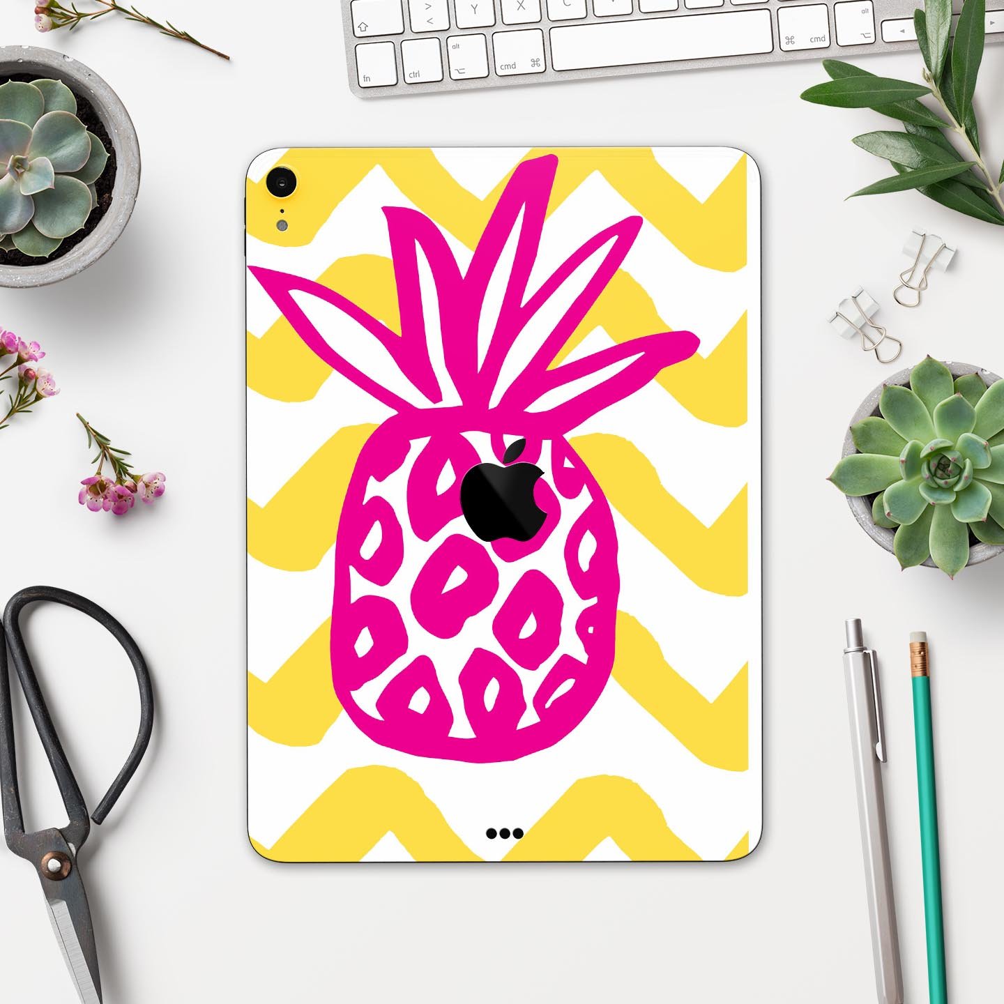 Pink and Yellow Pineapple skin decal for Apple iPad, showcasing vibrant colors and a stylish design.