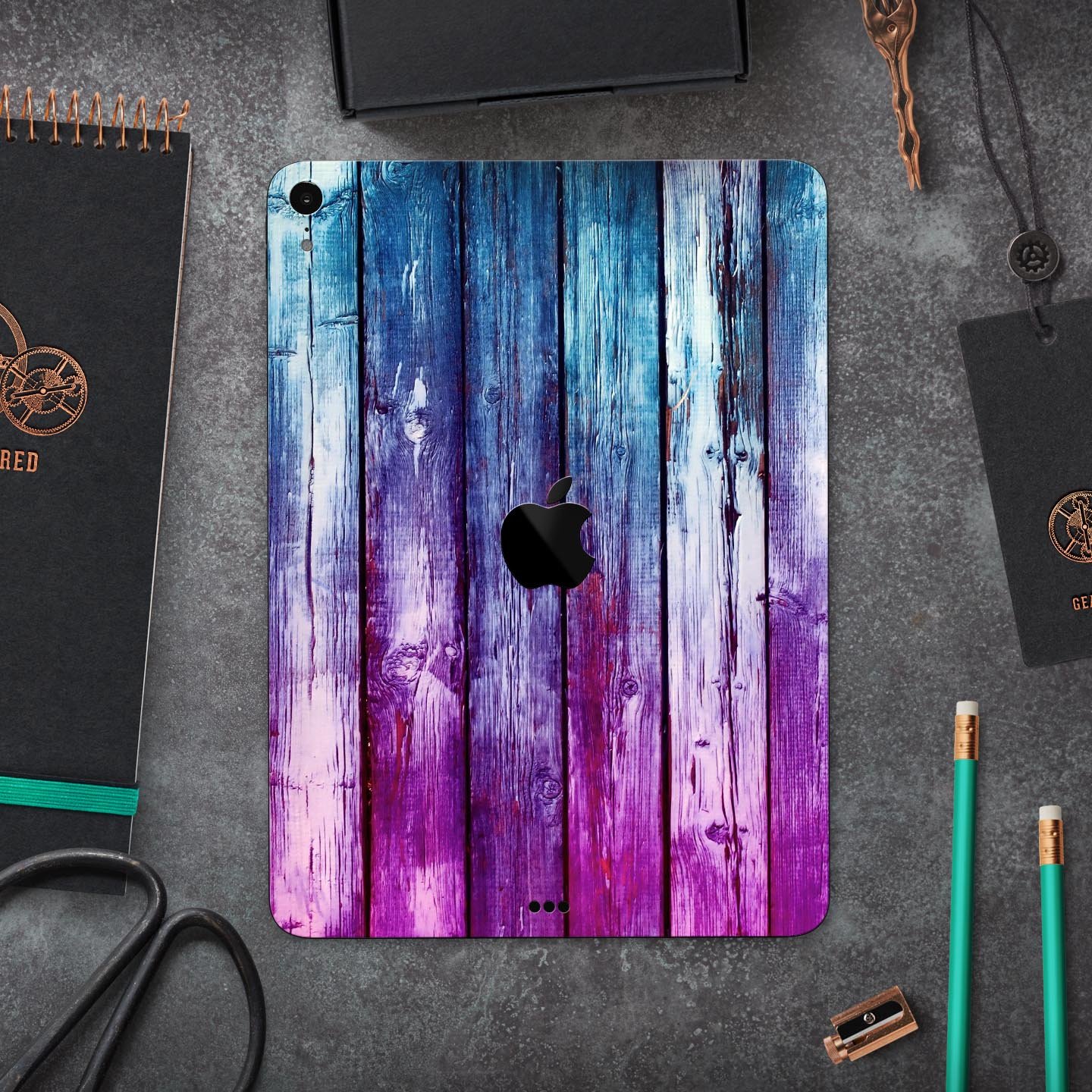 Pink and blue dyed wood skin decal for Apple iPad Pro, showcasing vibrant colors and a sleek design.